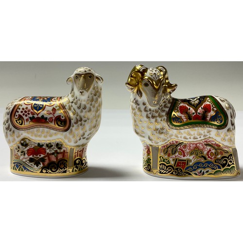 131 - A Royal Crown Derby paperweight, Imari Ram, Visitor's Centre exclusive, gold stopper, associated cer... 