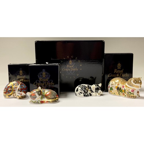 146 - A Royal Crown Derby paperweight, Cottage Garden Cat, 21st anniversary gold stopper, boxed; others, C... 