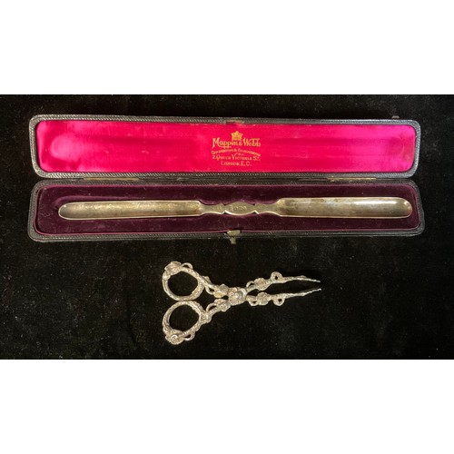 152 - A pair of Victorian sugar bows, cast ornately with leafy branches and blossom, c.1890, 33.9g; an Edw... 