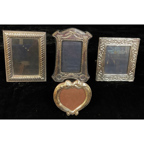 153 - A silver rectangular photograph frame, 19cm x 17cm, London 1986; another, Victorian style, London 19... 