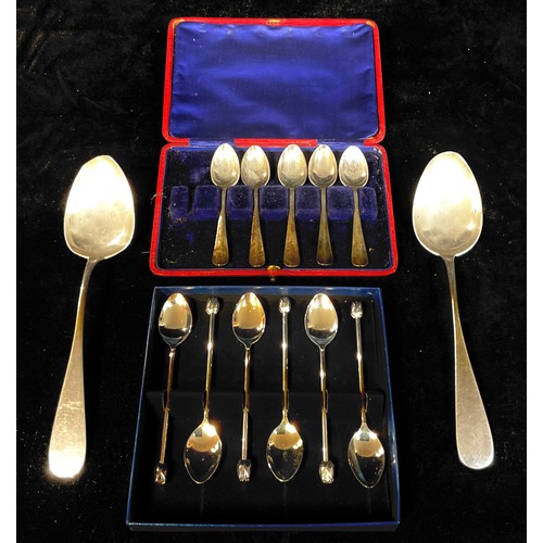 155 - A pair of silver serving spoons, marked 830 Tostrup 1889, engraved Thora and Alfred, 101g; a set of ... 