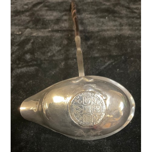 156 - A Georgian silver toddy ladle, set with a George I coin 1723, twisted baleen handle, unmarked; a lat... 