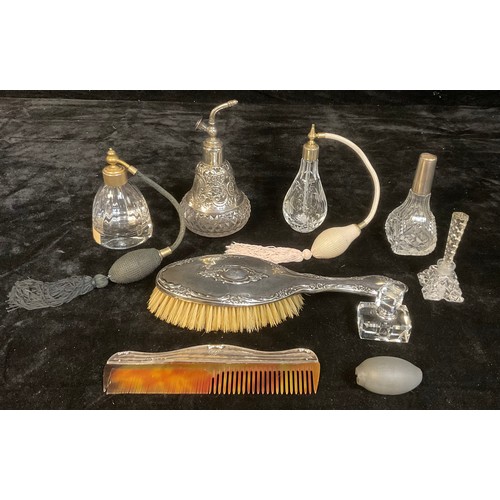 169 - A silver hair brush, Chester 1910; a silver mounted comb, Birmingham 1911; a silver mounted clear gl... 