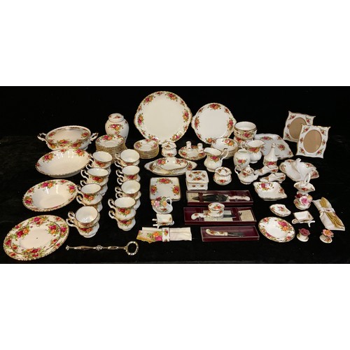 175 - A Royal Albert Old Country Roses pattern vegetable dish and cover, teacups and saucers, coffee cups ... 