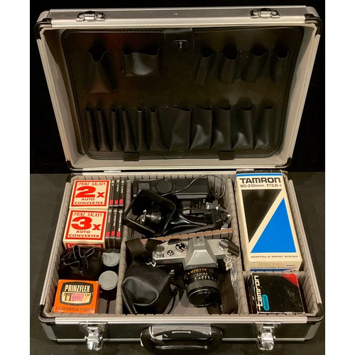 446 - A photography outfit in carry case comprising, Mamiya DSX 1000 35mm camera with Mamiya/Sekor Auto SX... 