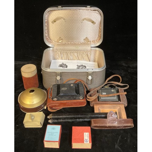 449 - A Zeiss Ikonta camera, flash, accessories, etc; a Dehel camera, etc, qty