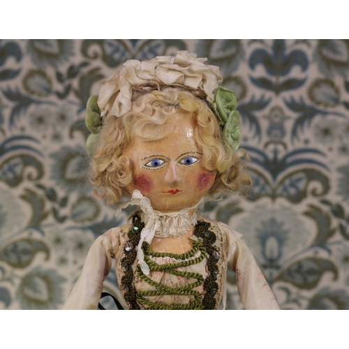 2048 - A late 18th century 'Queen Anne' type English carved and painted wooden doll, the carved and painted... 