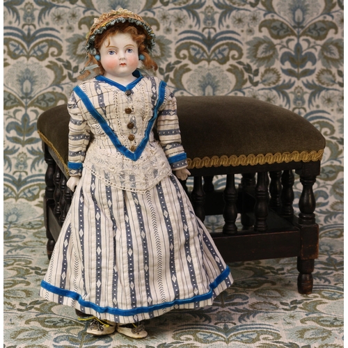 A 19th century pale Parian type shoulder head doll, the Pari...