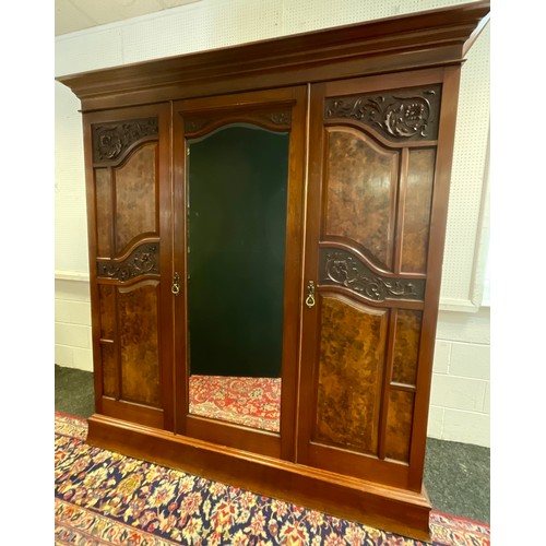 52 - A Victorian mahogany and burr walnut compactum  wardrobe, architectural pediment, central full lengt... 