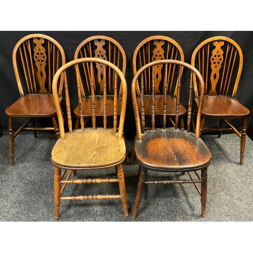 63 - A pair of 19th century elm spindle-back chairs, 85.5cm high (42.5cm to seat);  a set of four late 19... 