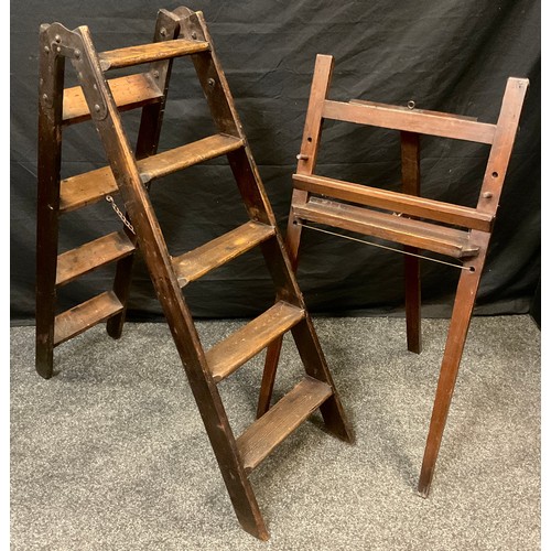 71 - An early Victorian pine step ladder, 121cm high x 37cm wide, c.1860;  a 19th century stained pine ea... 