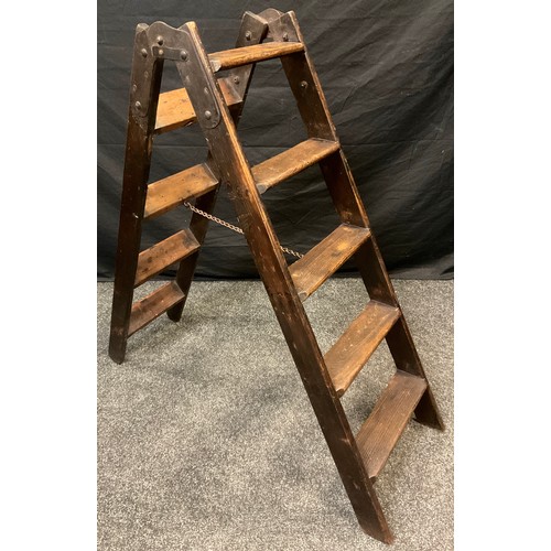 71 - An early Victorian pine step ladder, 121cm high x 37cm wide, c.1860;  a 19th century stained pine ea... 