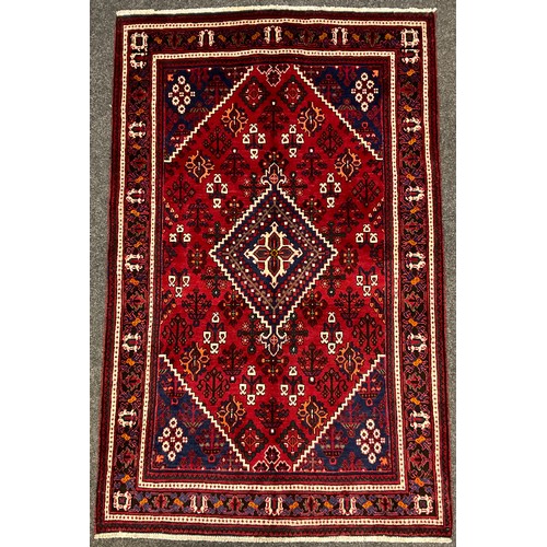 75 - A North West Persian Josheghan rug / carpet, hand-knotted with central diamond medallion within a fi... 