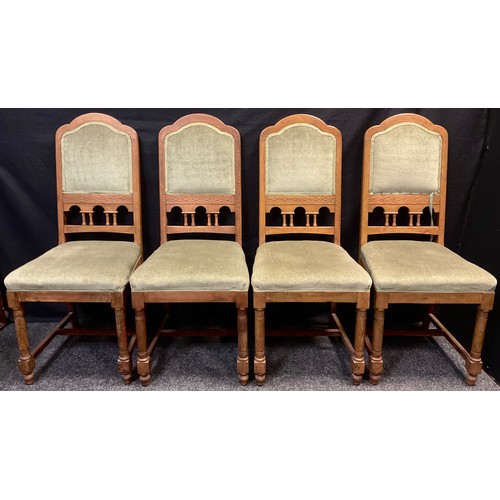 76 - A set of four early 20th century oak dining chairs, 108cm high, (4).