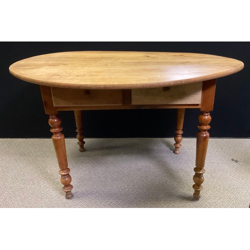 126 - An early 20th century French fruitwood oval kitchen table, pair of drawers to frieze, turned legs, 7... 