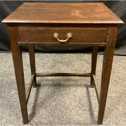 130 - An early 20th century oak Lowboy side table, by Jas Shoolbred & Co. Of Tottenham Court Road, oversai... 