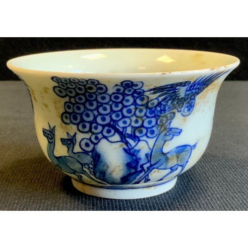 166 - A modern blue and white Chinese tea bowl, decorated with wildlife, 9.5cm wide