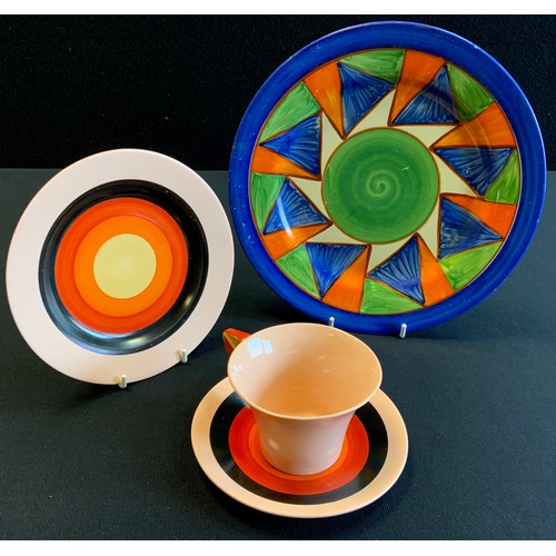 175 - A Clarice Cliff Newport pottery Bizarre Damask Rose pattern trio, cup, saucer and side plate,the cup... 