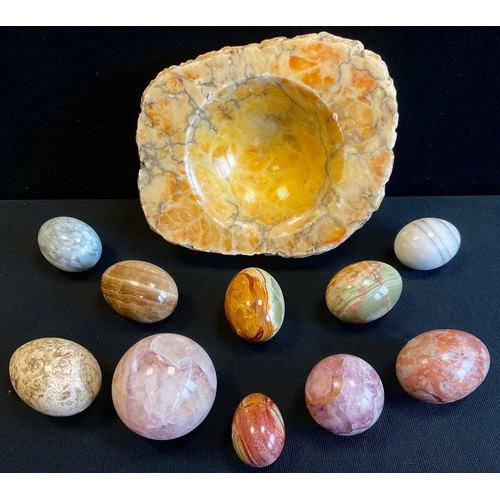 194 - Geological interest - specimen stone globes and eggs - an amethyst stone globe 7cm diameter, and ano... 