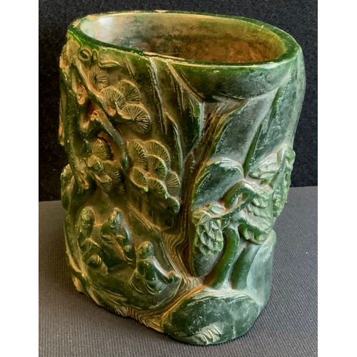 198 - A modern Chinese carved green brush pot, possibly jade, impressed mark, 16cm high, 14cm wide