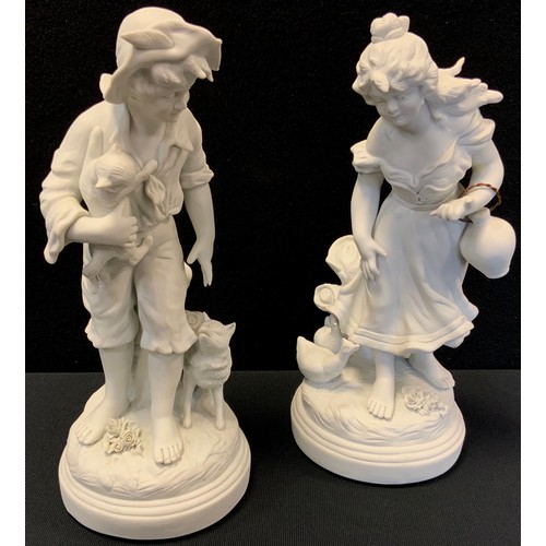 208 - A pair of reproduction French bisque figures boy and girl with animals (2)