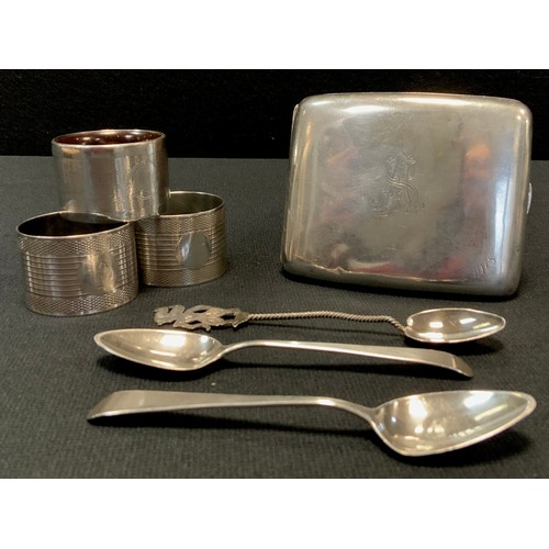 444 - A pair of silver banded and engine turned napkin rings,  Sheffield 1960, cased;    silver cigarette ... 