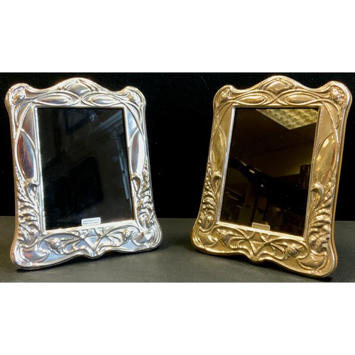 446 - A pair of silver Art Nouveau style photo frames, London 2021,12.5cm x 9cm (excluding frame)(2)