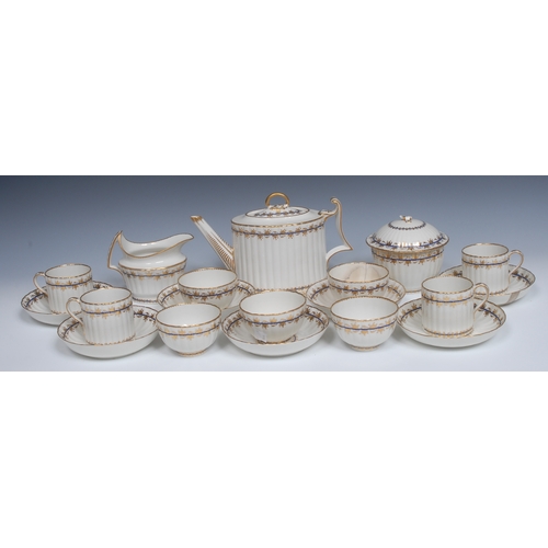 768 - A Derby tea service,  comprising fluted teapot and stand, sucrier and cover, milk jug, seven tea sau... 