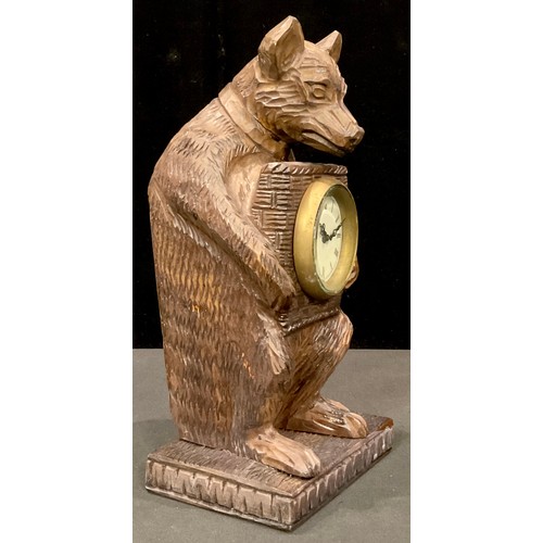 774 - Novelty black forest type timepiece carved as a bear, mechanical movement, 30cm high