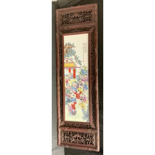 781 - Interior Design - A reproduction Chinese Famille Rose style porcelain wall plaque, mounted in a pier... 