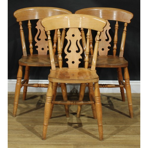 103 - A Victorian style pine farmhouse kitchen dining table, 76.5cm high, 122cm long, 77cm wide; three cha... 