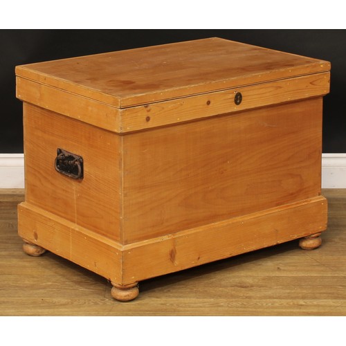 105 - A late 19th/early 20th century pine blanket chest, hinged top enclosing a till and two small drawers... 