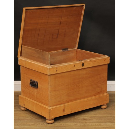 105 - A late 19th/early 20th century pine blanket chest, hinged top enclosing a till and two small drawers... 