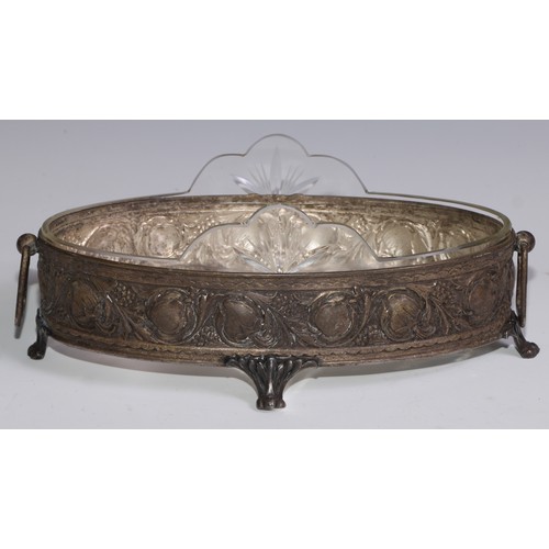 1302 - An Art Nouveau table jardiniere, in the manner of WMF, embossed in relief with stylised fruiting and... 