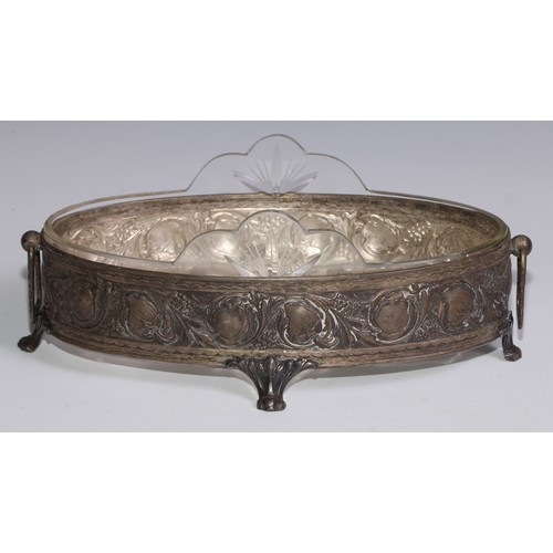 1302 - An Art Nouveau table jardiniere, in the manner of WMF, embossed in relief with stylised fruiting and... 