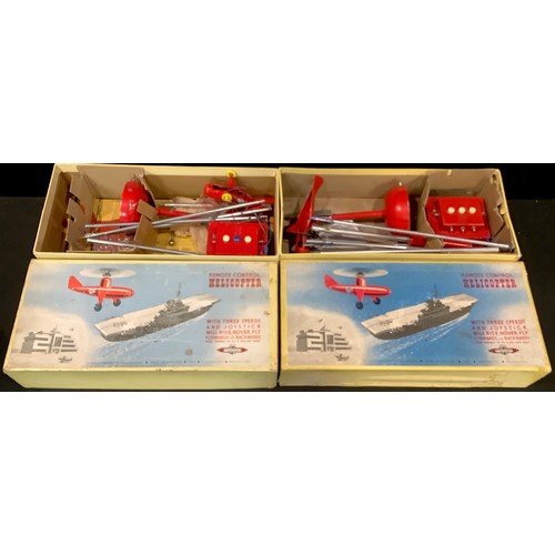 460A - Toys & Juvenalia - a Nulli Secundus tinplate remote control helicopter educational toy, boxed; anoth... 