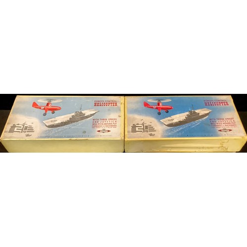 460A - Toys & Juvenalia - a Nulli Secundus tinplate remote control helicopter educational toy, boxed; anoth... 