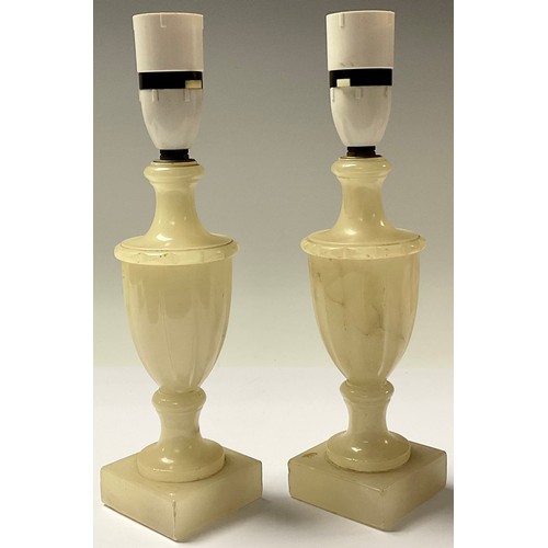 1426 - Interior Decoration - a set of three alabaster slender ovoid table lamps; a brass five branch electr... 