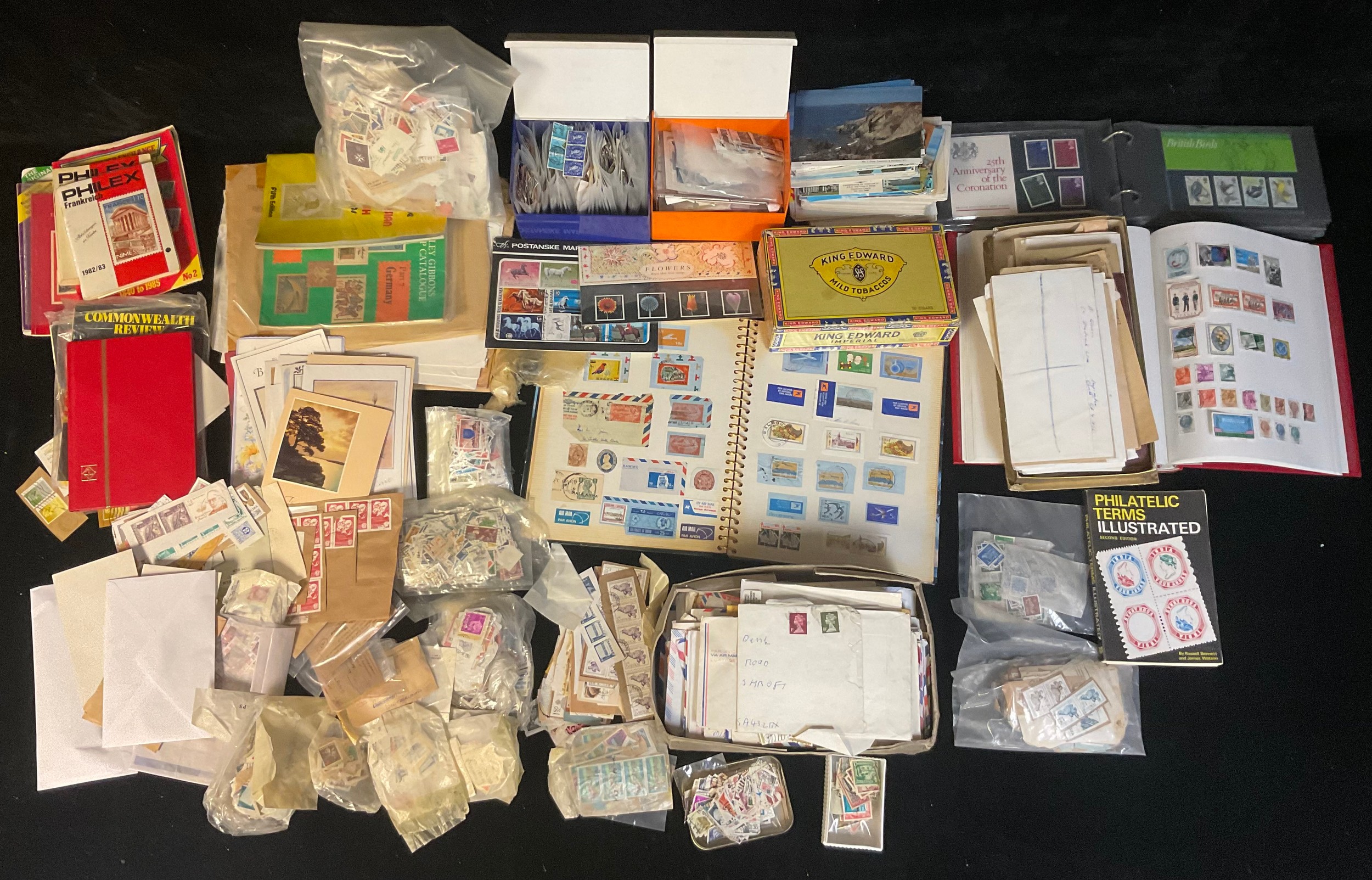 Stamps - three large containers of general stamp materials, etc, quantity