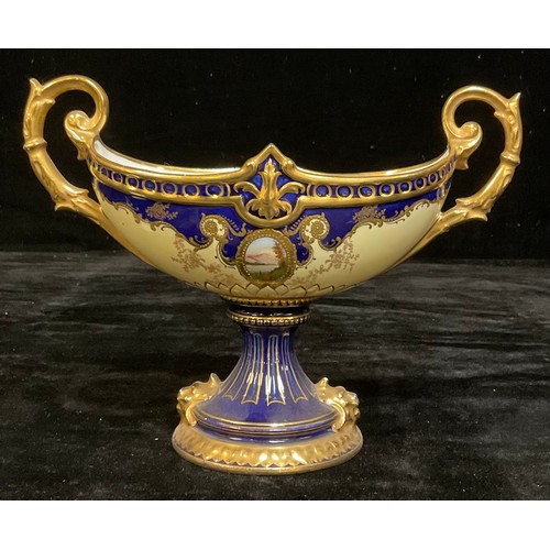 1455 - A porcelain twin-handle navette-shaped urn, in the manner of Coalport, 19cm high, 25cm wide, printed... 