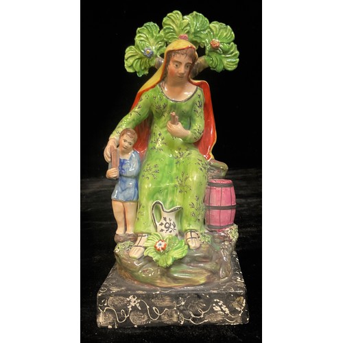 1456 - A Staffordshire Pearlware figure, Ralph Wood, widow of Zarepeth with oil and barrel, 25.5cm high, c.... 