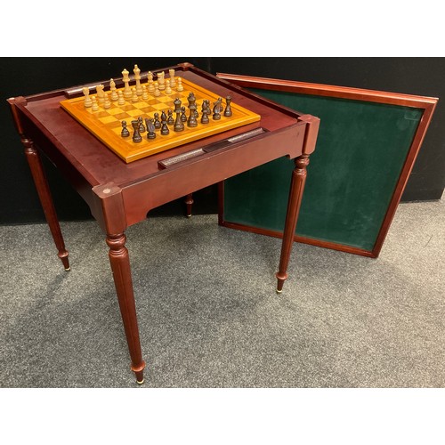 44 - A 20th century mahogany games table, square removable top with green felt surface to inside, enclosi... 