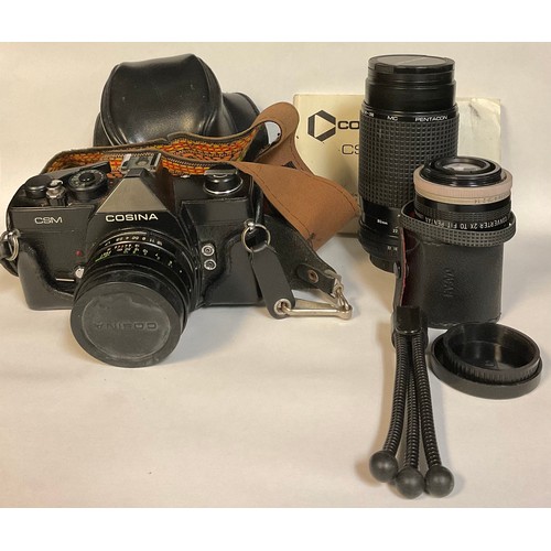 362 - A Cosina CSM 35mm camera, Cosinon Auto MC lens, No.849345, with instruction booklet; a Practica PM P... 