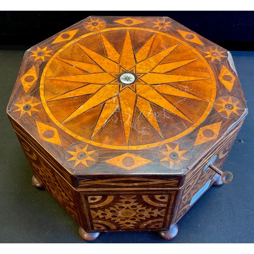 365 - A mahogany and walnut marquetry inlaid octagonal shaped sewing/work box