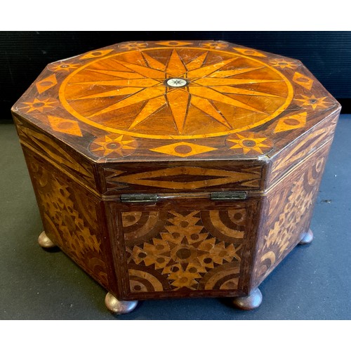 365 - A mahogany and walnut marquetry inlaid octagonal shaped sewing/work box