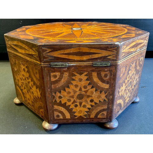 365 - A mahogany and walnut marquetry inlaid octagonal shaped sewing/work box