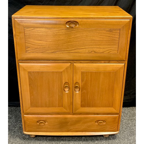 43 - An Ercol ‘Windsor’ model 469 Elm bureau cabinet, 109cm high x 82.5cm wide x 44cm.