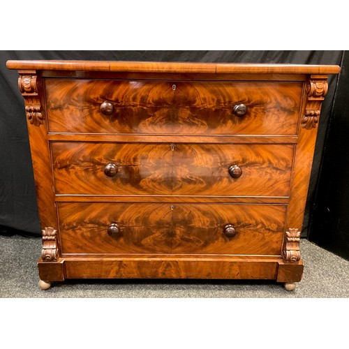 51 - A Victorian Flame-mahogany chest of drawers, over-sailing rounded rectangular top, three long gradua... 