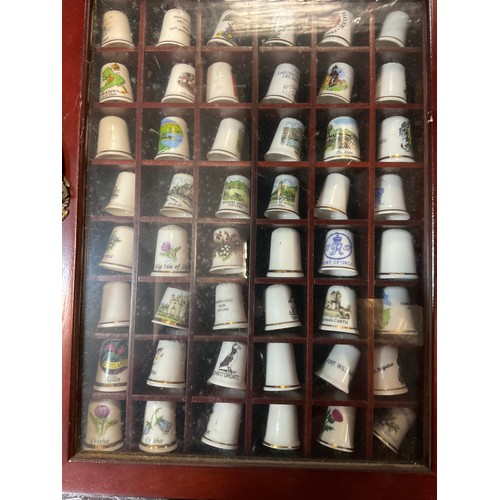 206 - Thimbles - Ceramic thimbles including; places, Old country roses, Peter rabbit; etc (approx 650)