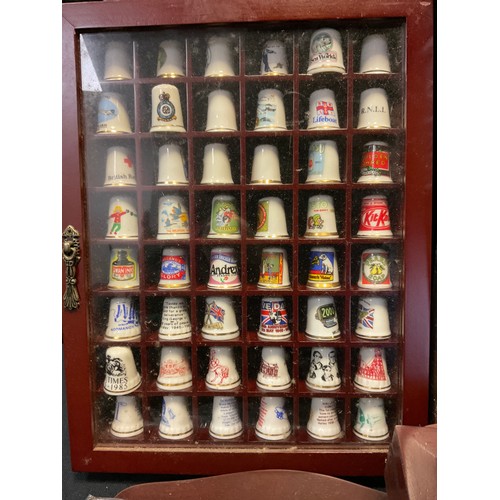 206 - Thimbles - Ceramic thimbles including; places, Old country roses, Peter rabbit; etc (approx 650)